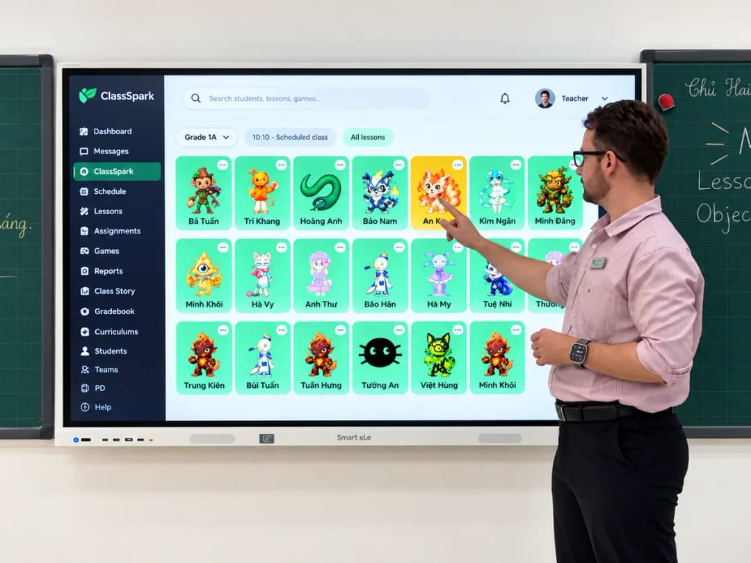 Teacher tapping a student card on a classroom smart board running KiwiBee ClassSpark